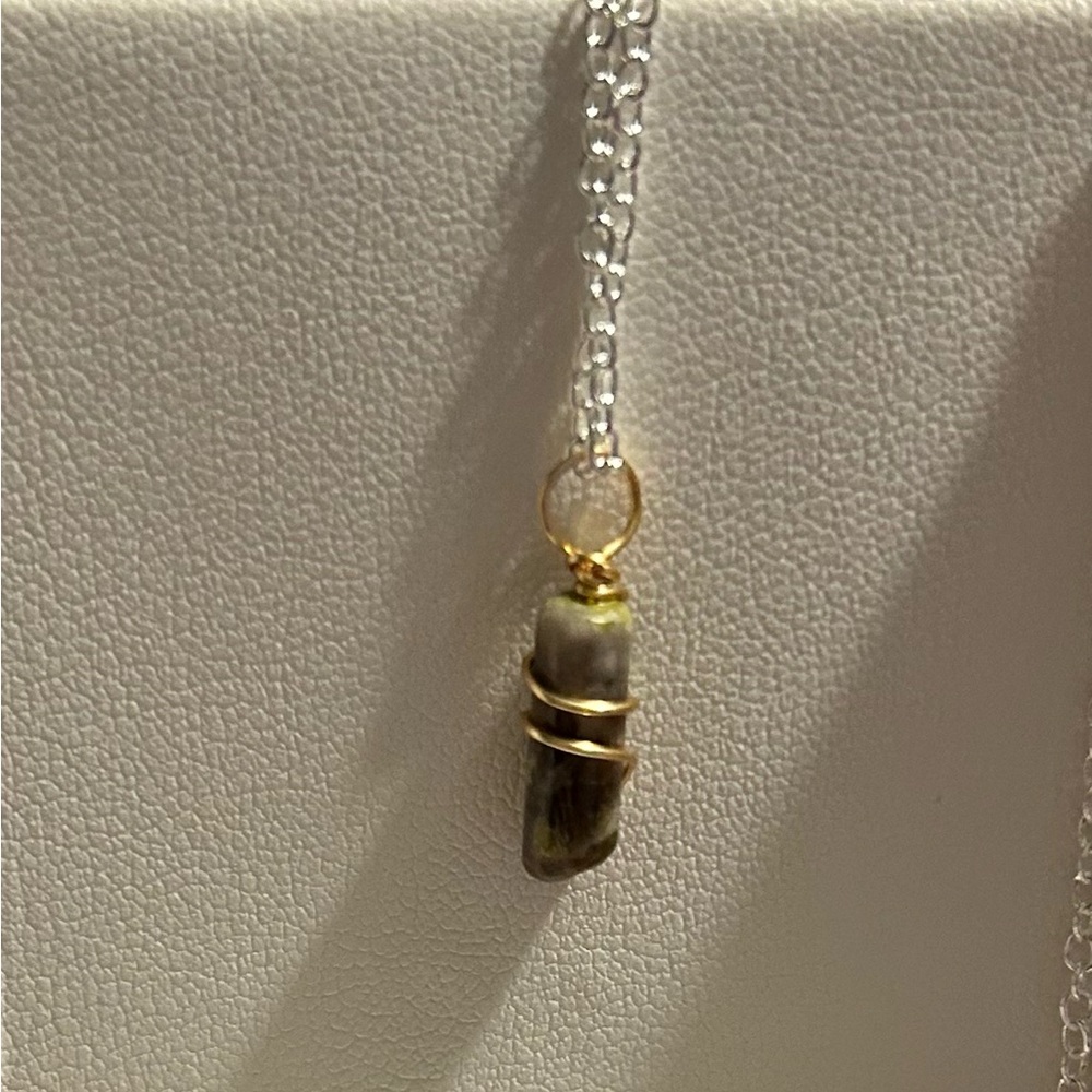 Elegant Gold and Silver Pendant Necklace